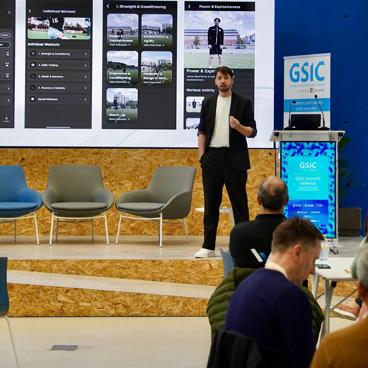Håkon Ege presenting FitFootball on the GSIC stage.