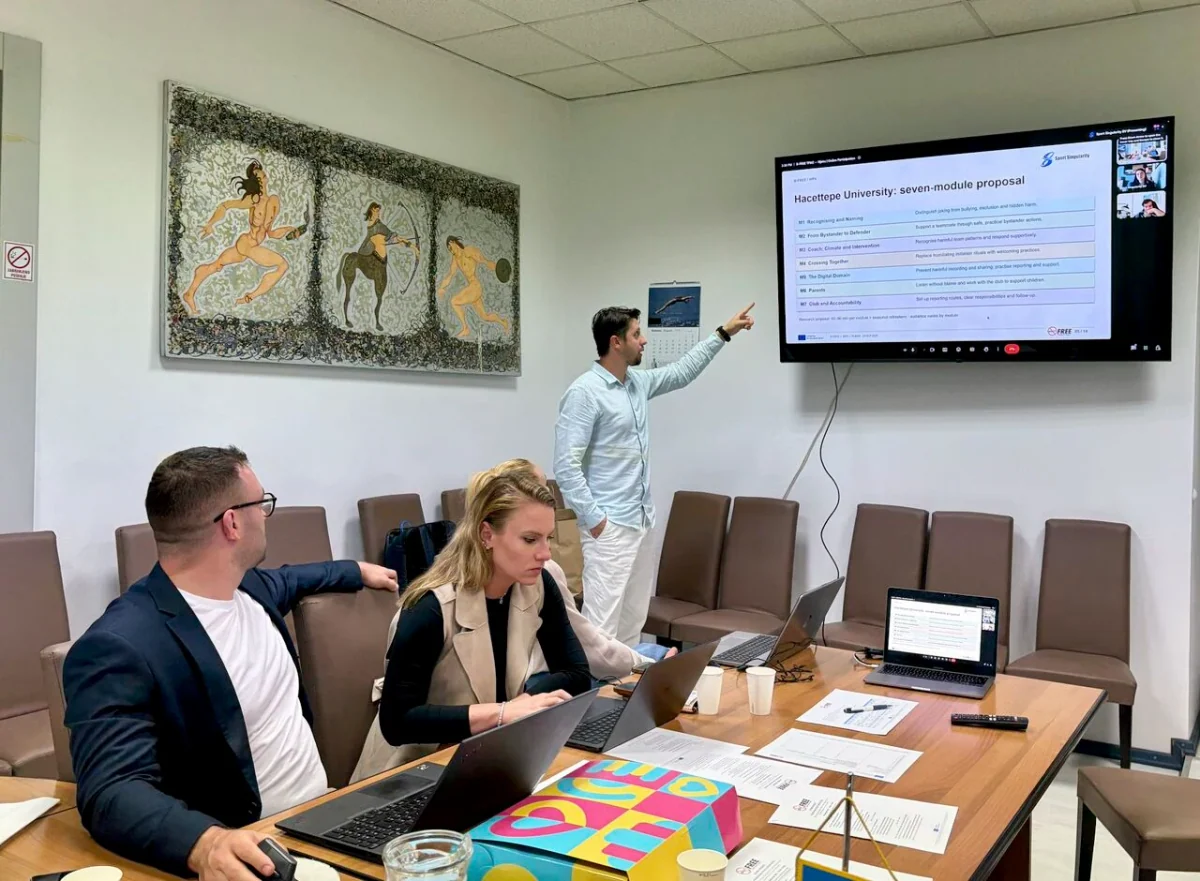 Project partners discussing coach training content at the B-FREE meeting in Rijeka.